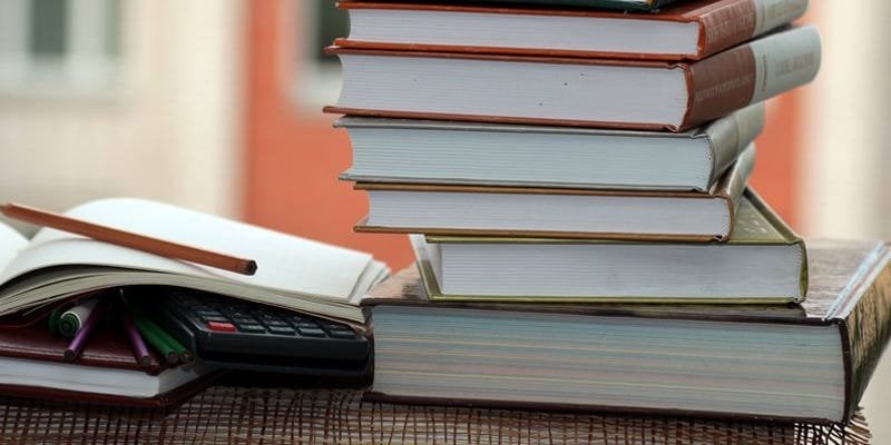 physical books desktop classroom