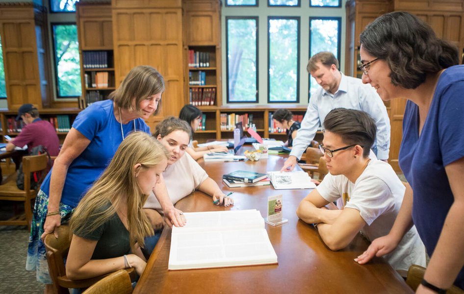 Students studying together in a library