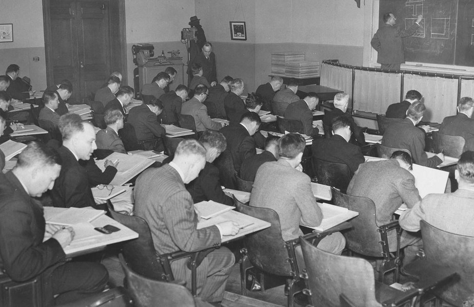 Historical image of a war industry training class