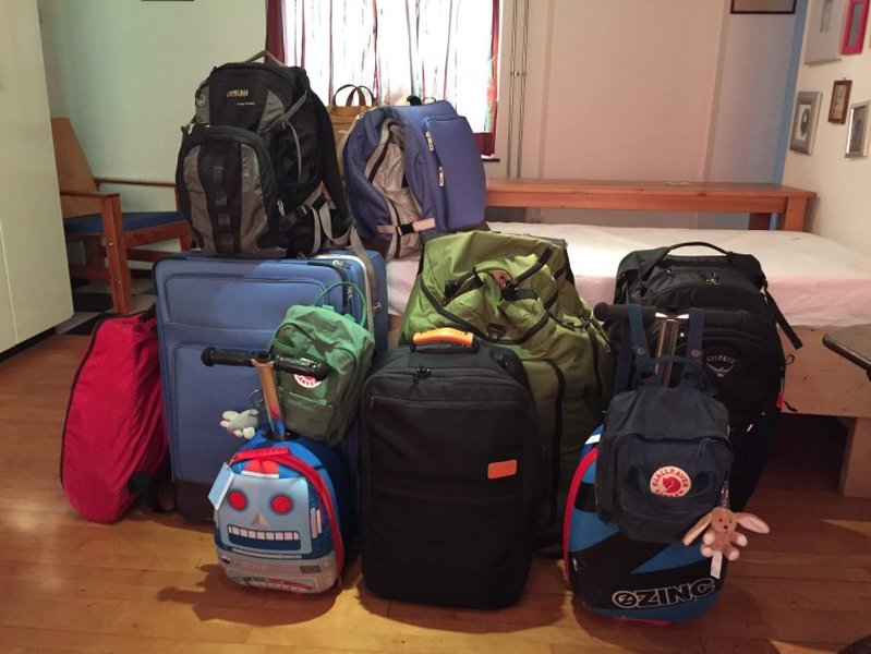 Packing cubes organizing clothes within a suitcase