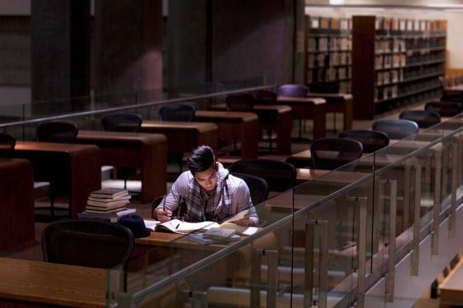 Student studying with technology