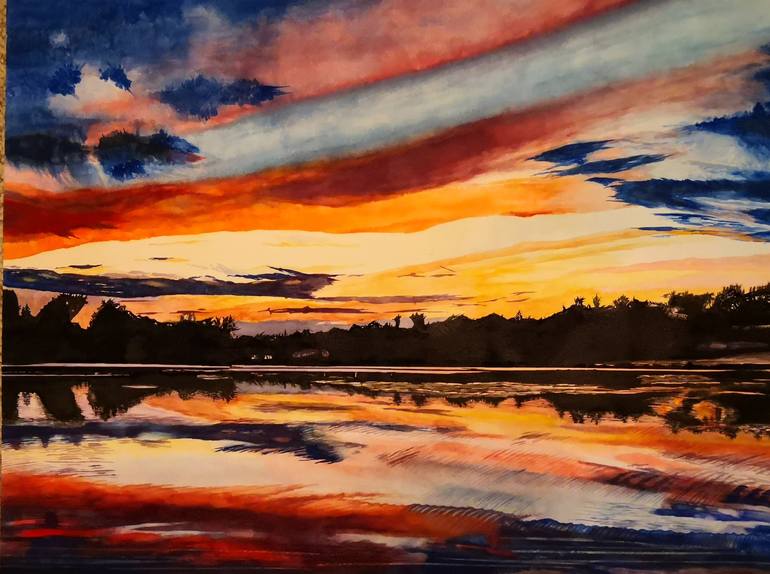 sunset over riverside landscape