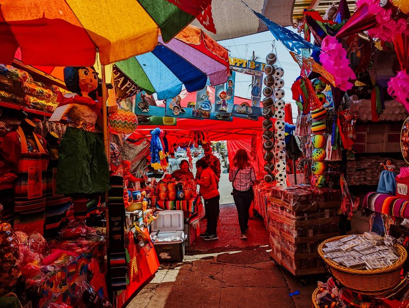 street food market with colorful food stalls