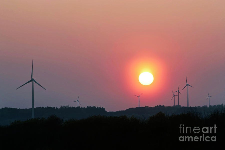 wind turbines on sunset horizon