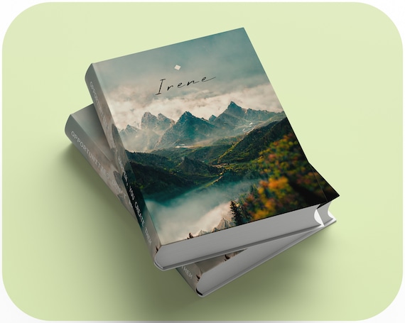 mountain landscape with notebooks and books