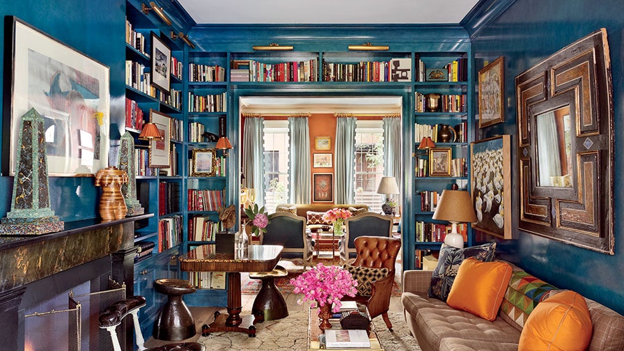 scenic photo of a library interior with books and tech