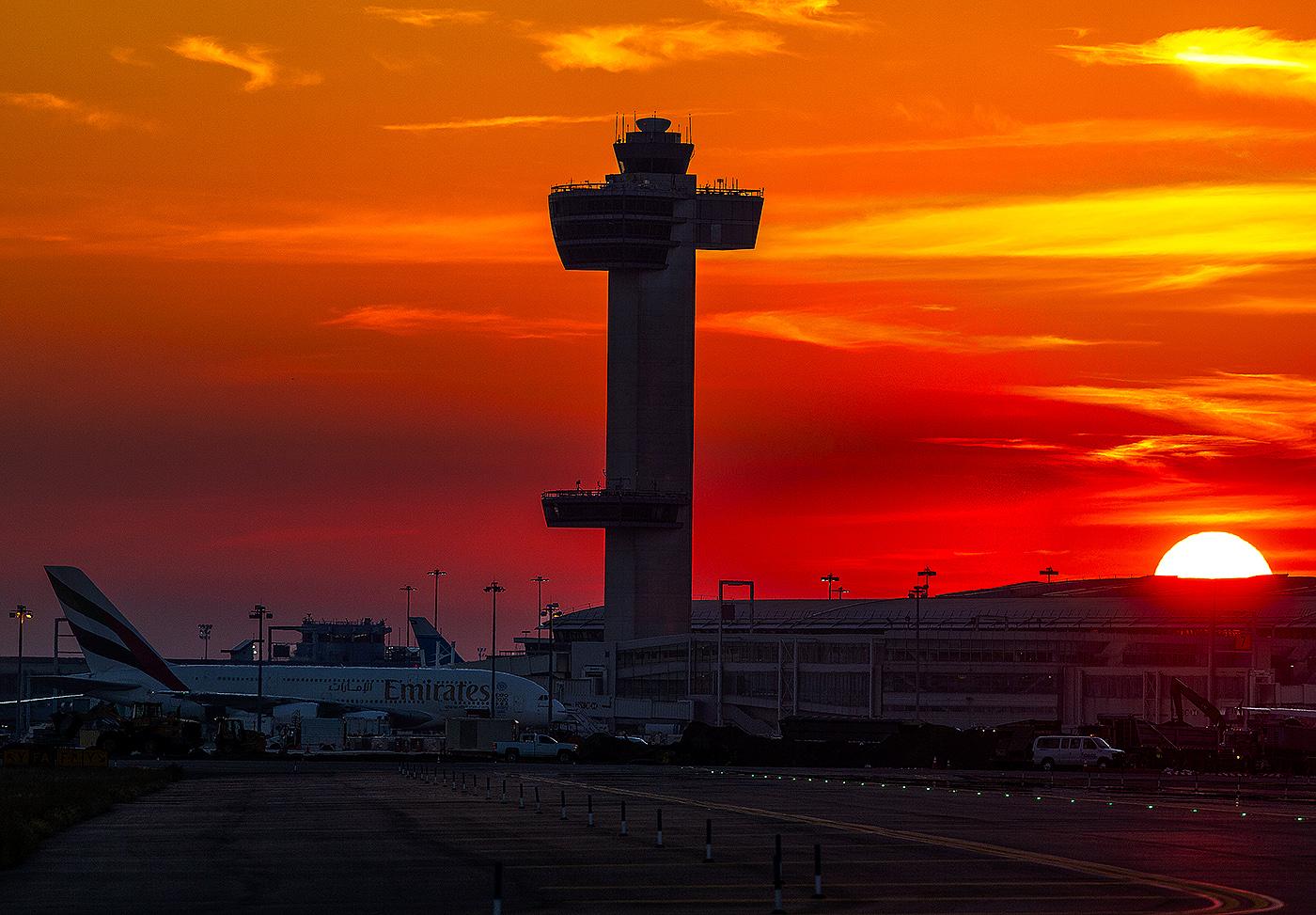 aviation control tower with sunset