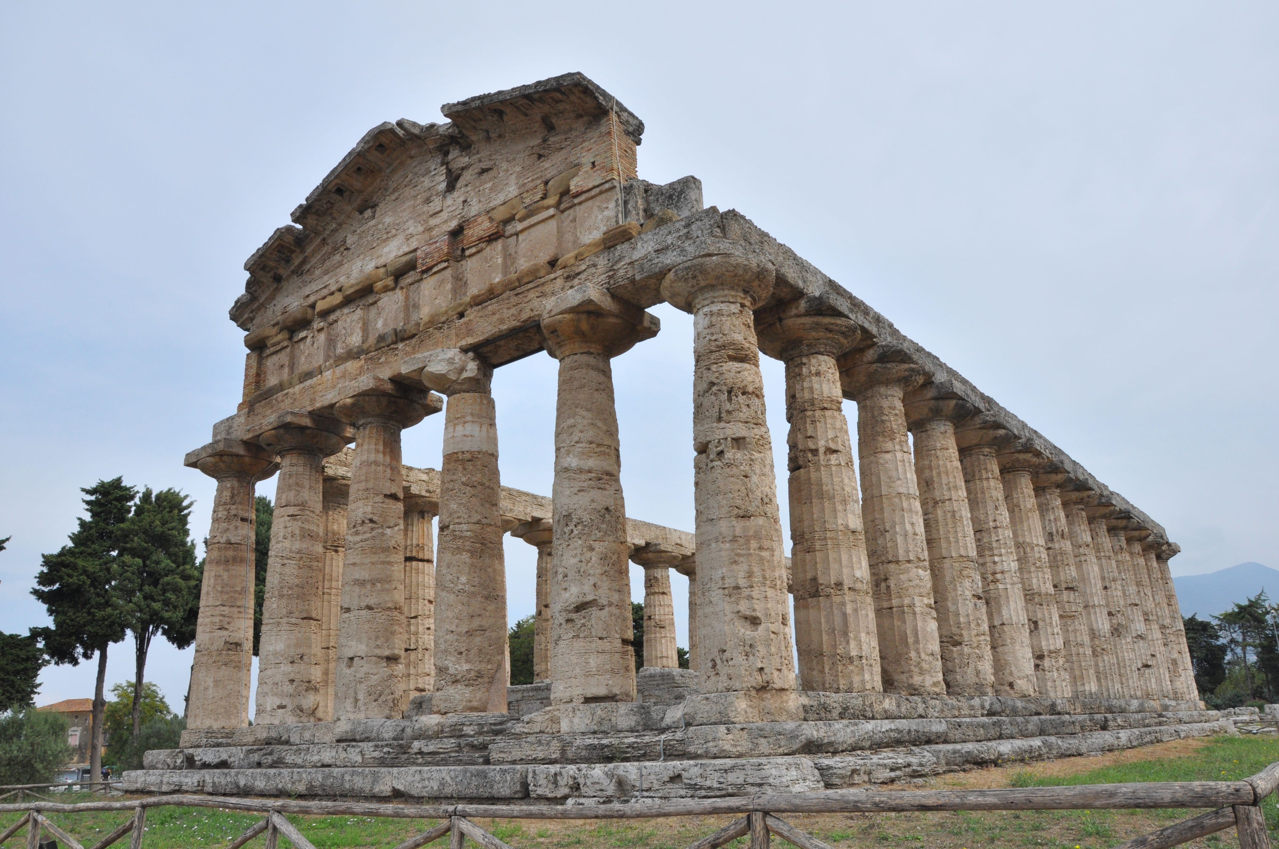 Greek temple ruins, ancient pillars, and classical sculptures