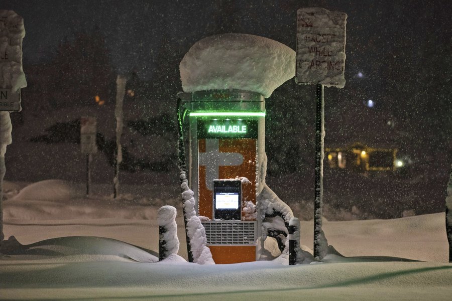 An EV charging in cold weather, highlighting the challenges of maintaining battery temperature.