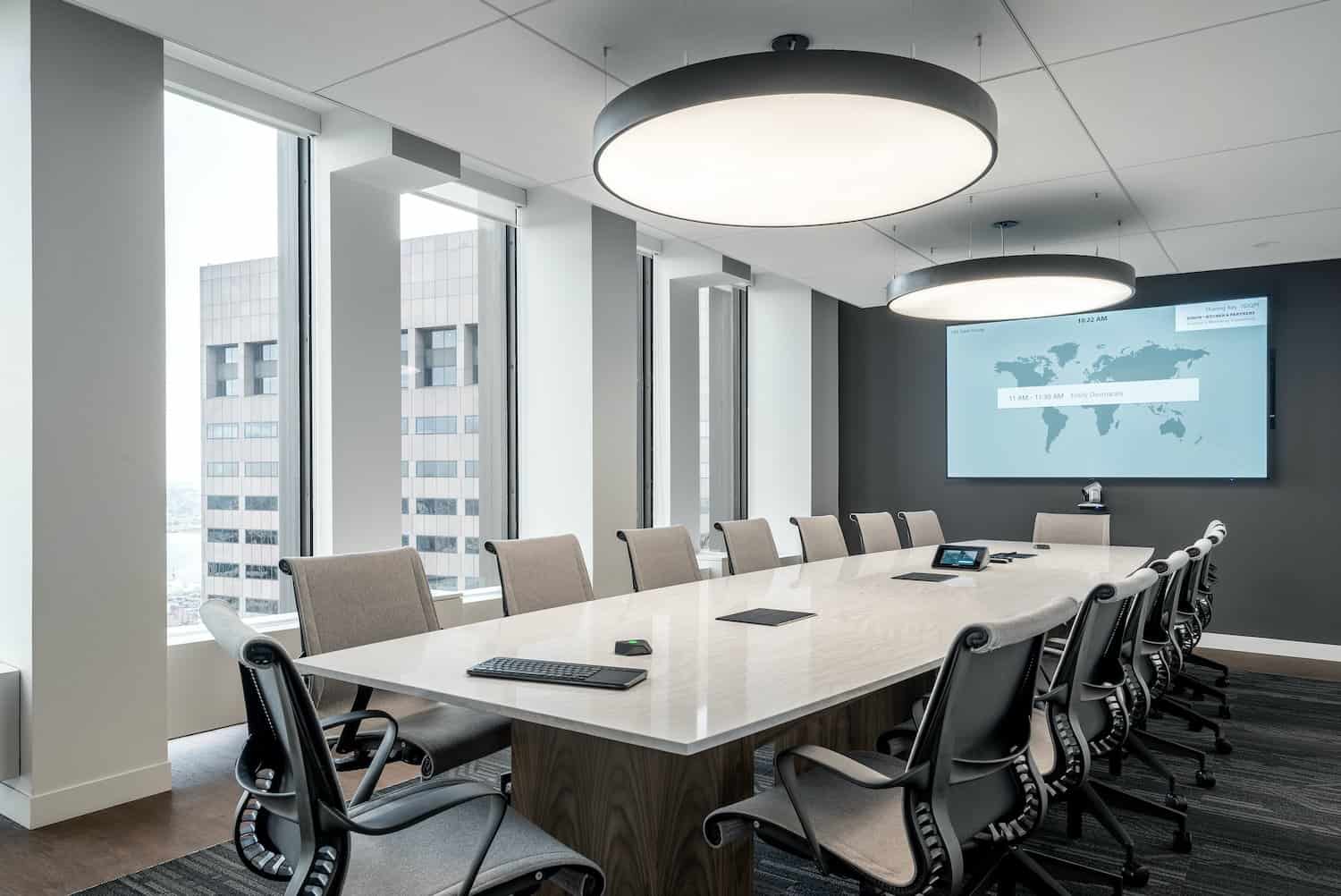 modern office building, technology equipment, team meeting