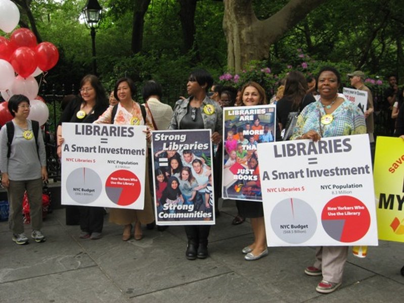 Library supporters rallying at City Hall