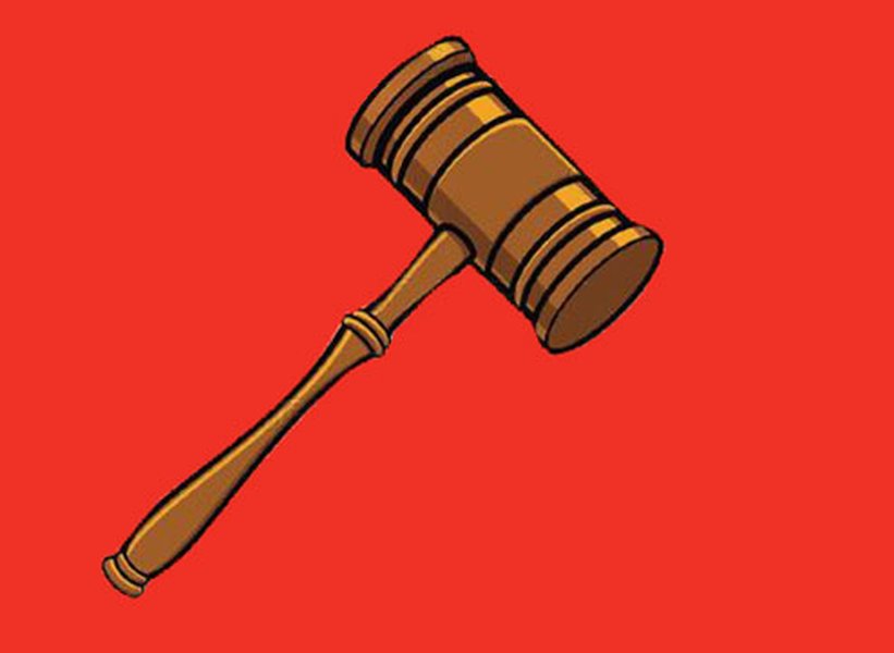 A judge's gavel on a desk, symbolizing the authority to rule on evidence admissibility.