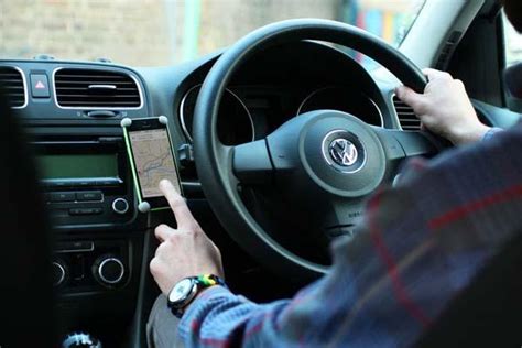 smartphone and car on display