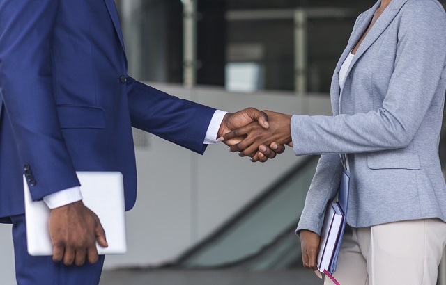 African business meeting outdoors