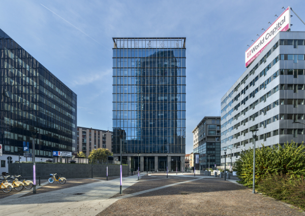 modern building facade with fintech graphics