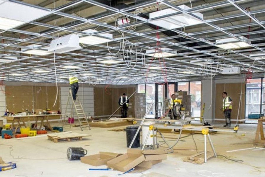 Construction professionals using technology on site