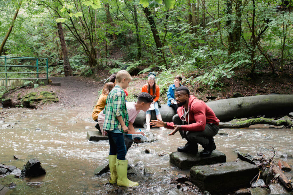 children learning finance outdoors