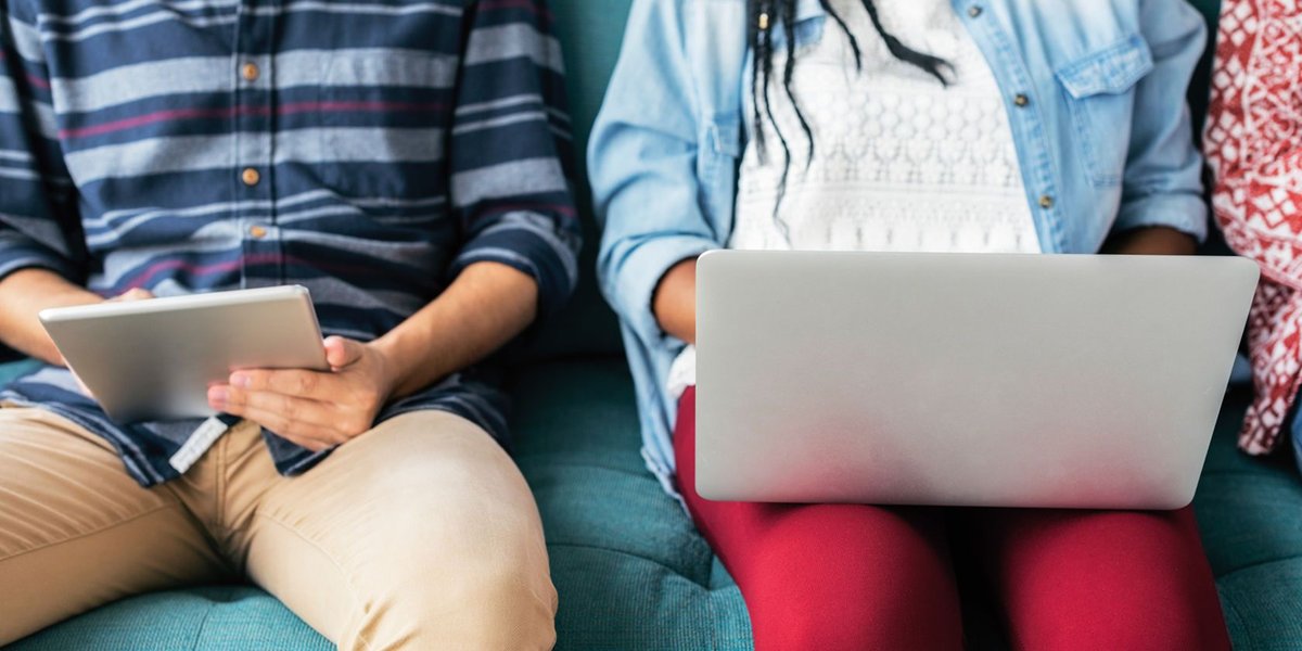 Person searching on social media on multiple devices