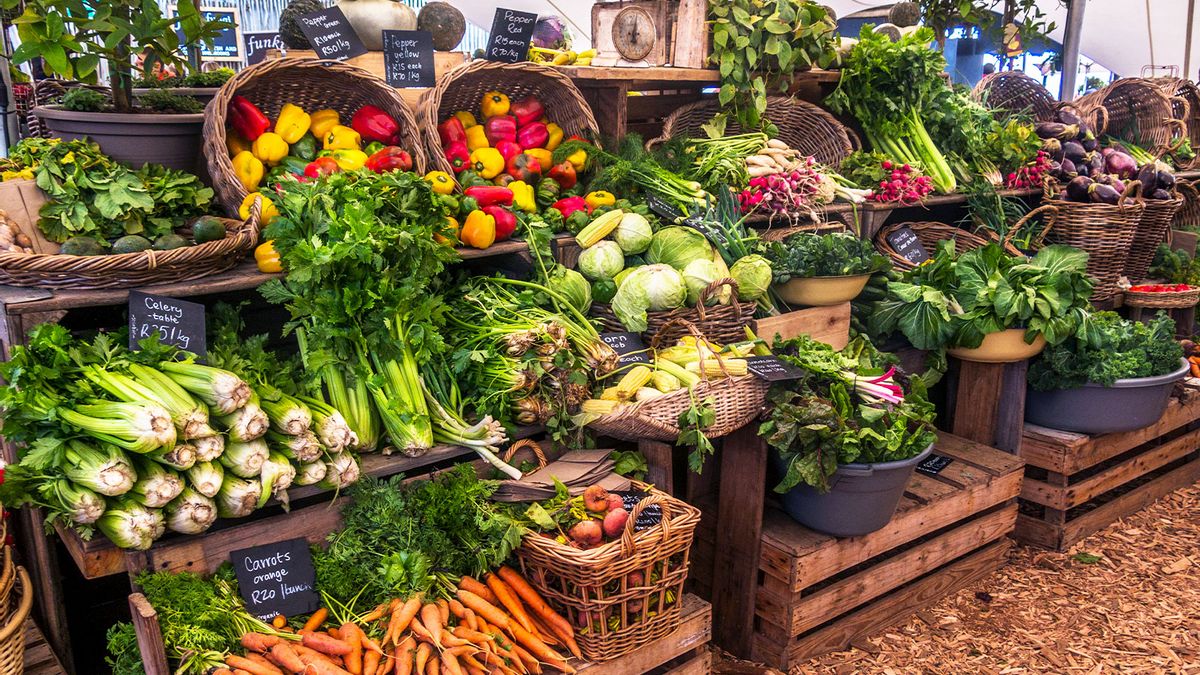 vibrant food market scene with fresh produce and cultural elements