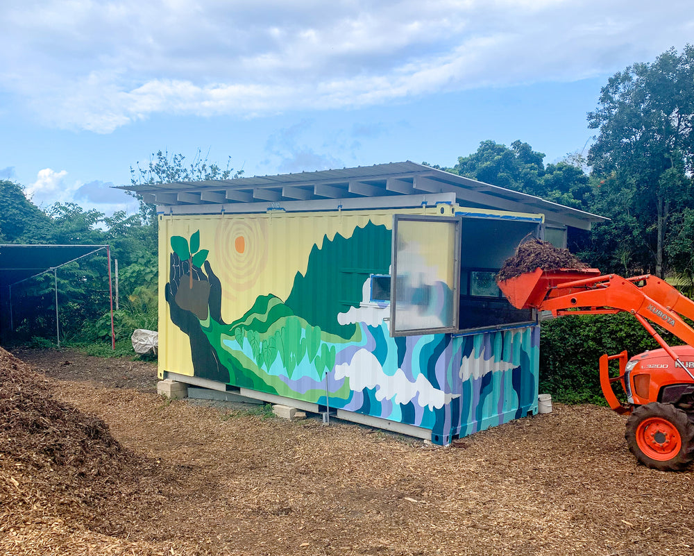 food waste composting machinery in field