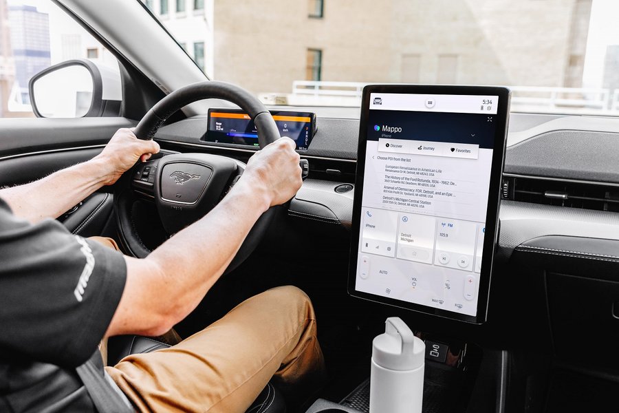 Ford Mach-E infotainment screen showing software update progress.