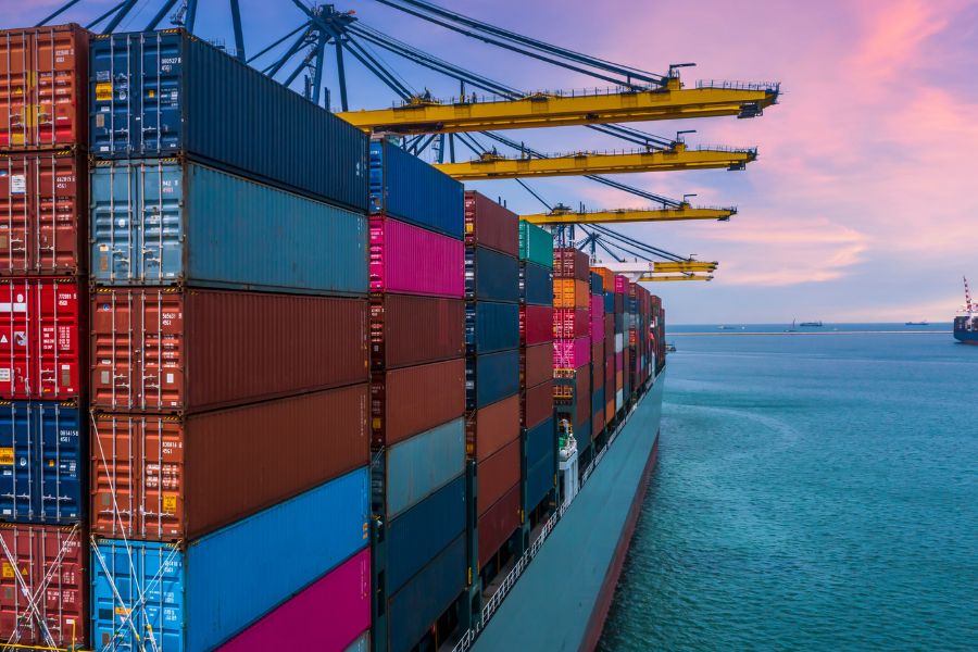 global business meeting and international shipping container