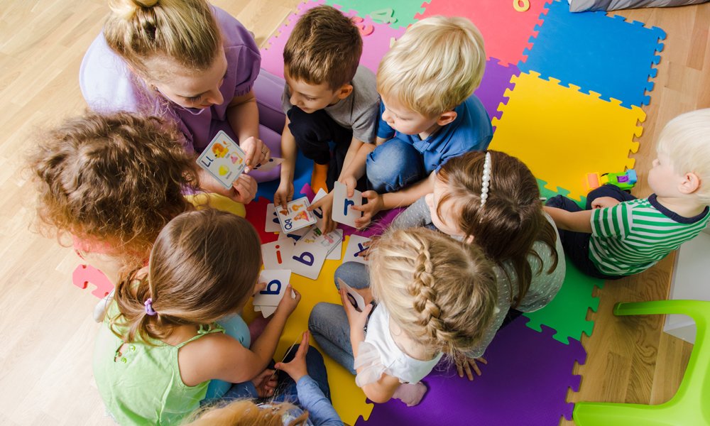 Children engaged in a cognitive development activity, symbolizing the importance of early skill nurturing.