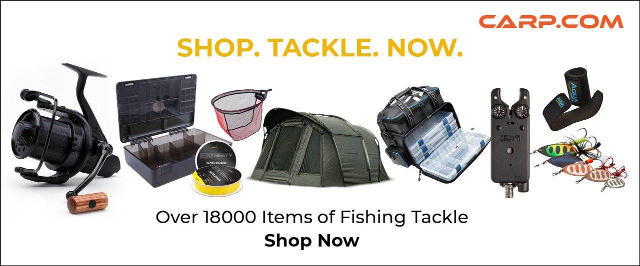 carp fishing equipment on tackle bag
