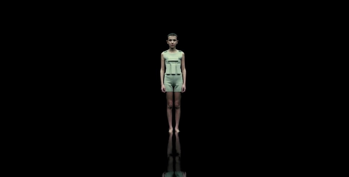 Eleven floating in the dark void, representing her mental isolation and powers