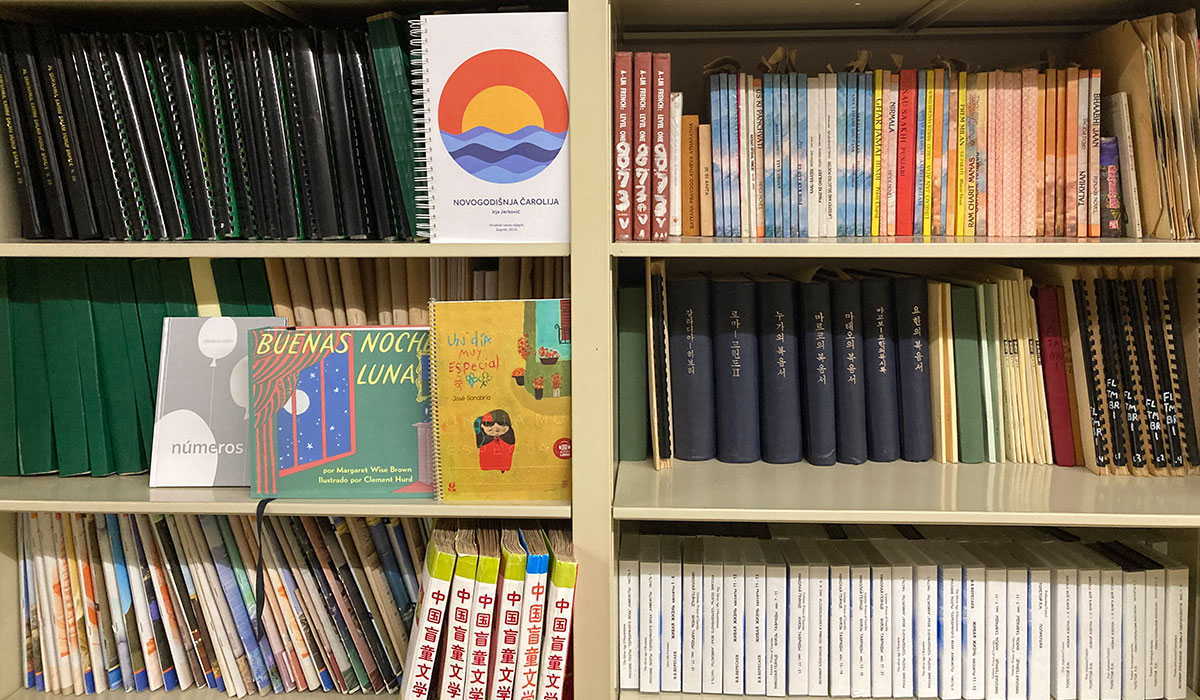 diverse educational materials physical books and devices