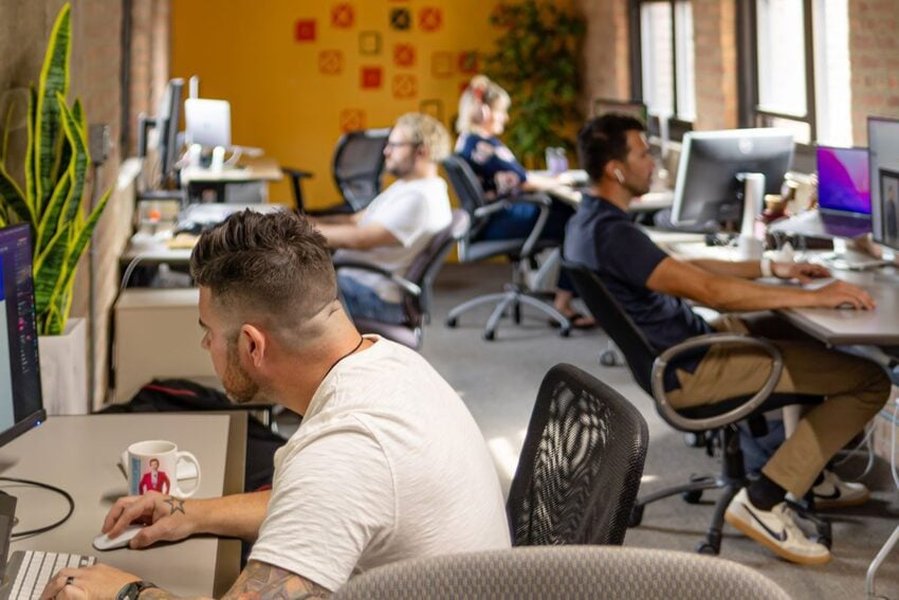 Web design team collaborating