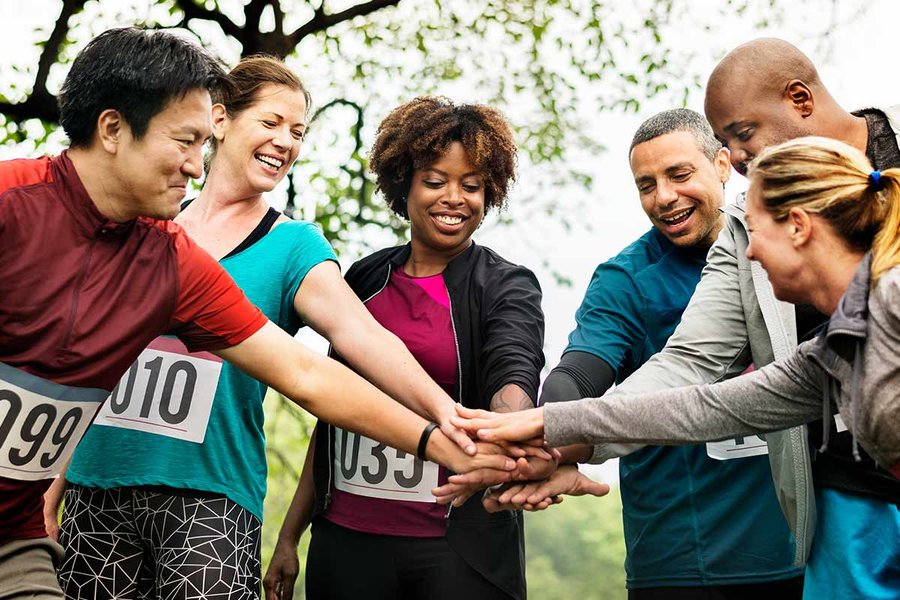 Group of people participating in an outdoor team-building activity