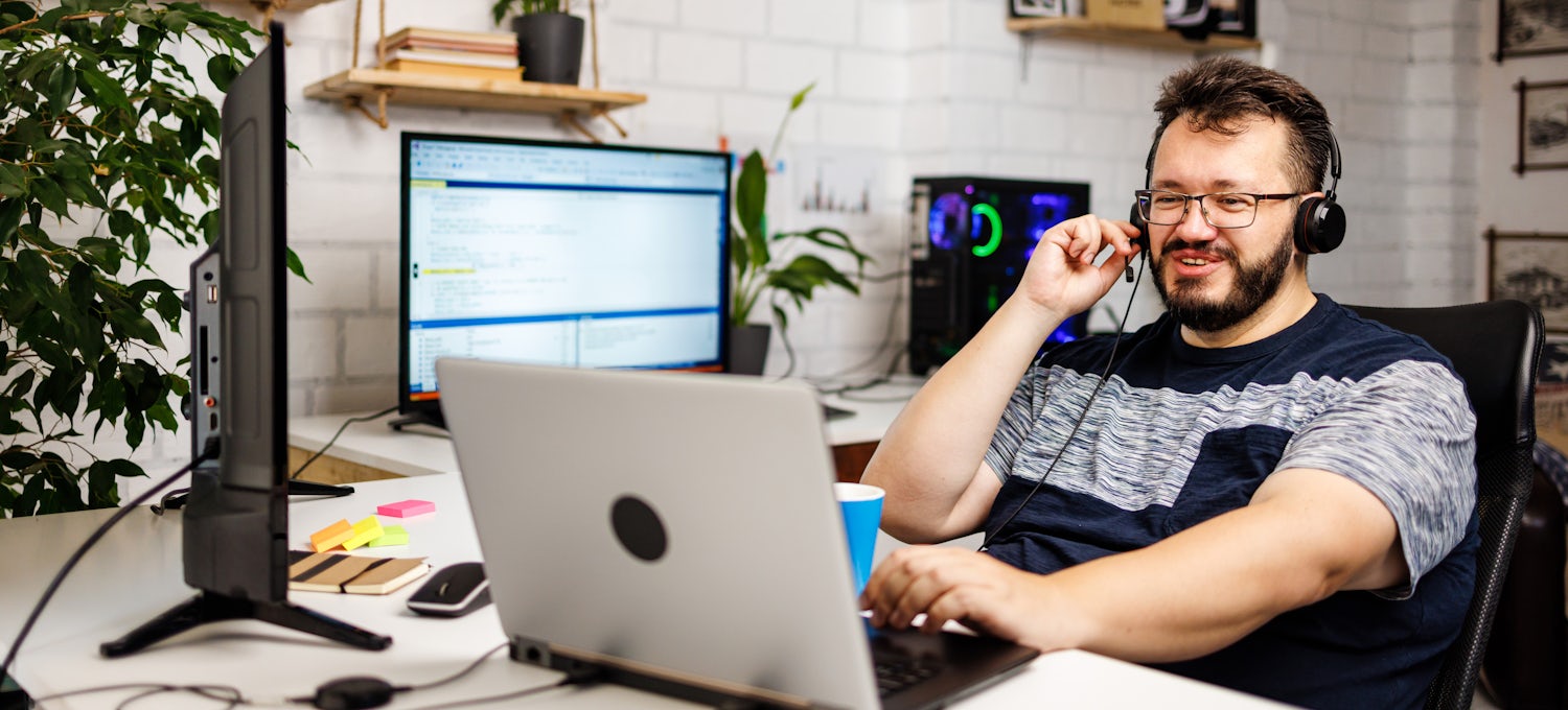 front end developer working on laptop