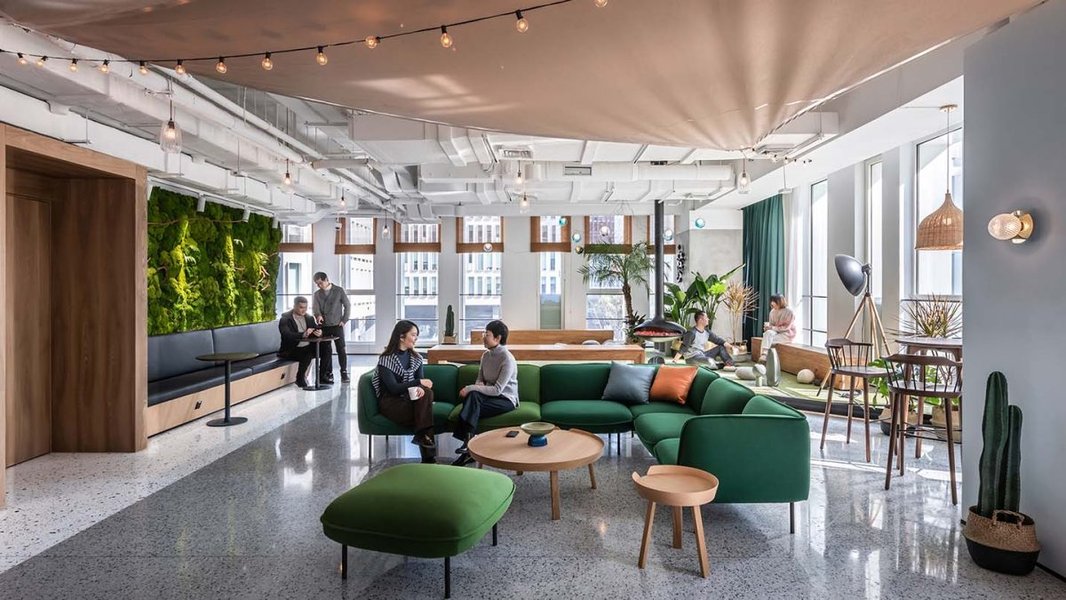 Modern office lounge area designed for informal collaboration and community building