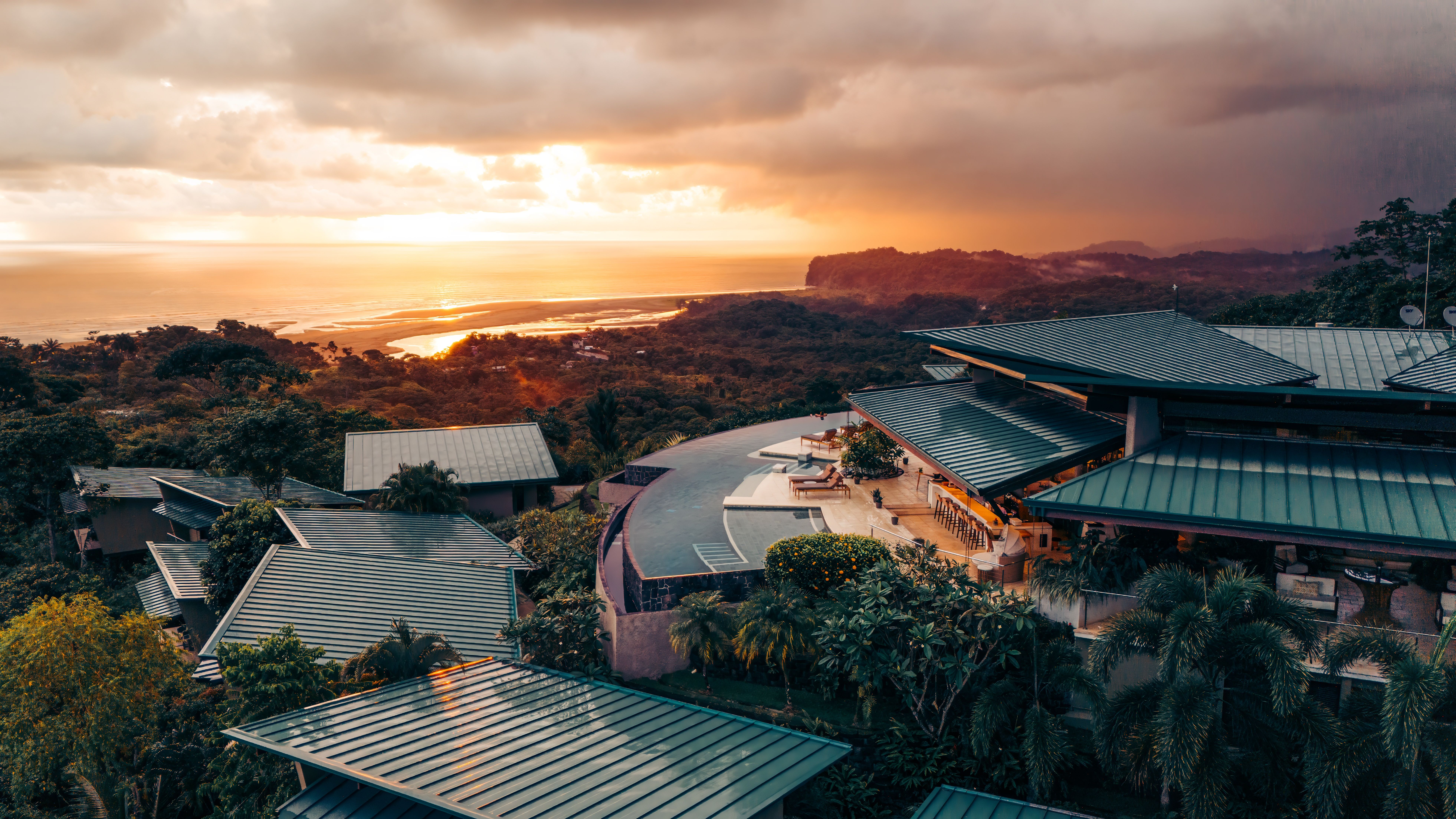 scenic view of modern hotel building at sunset