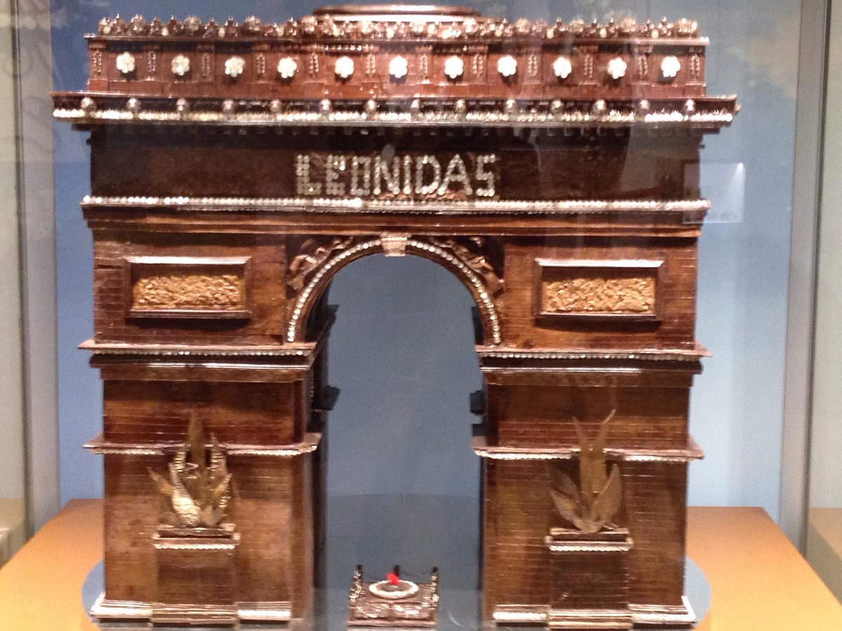 historic sculpture, old European architecture, luxury chocolates