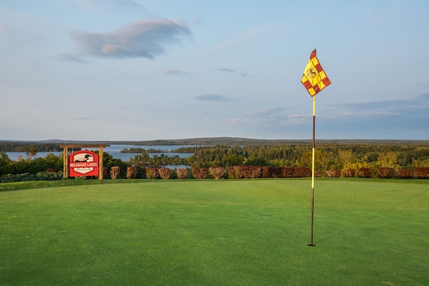 scenic road with golf flags