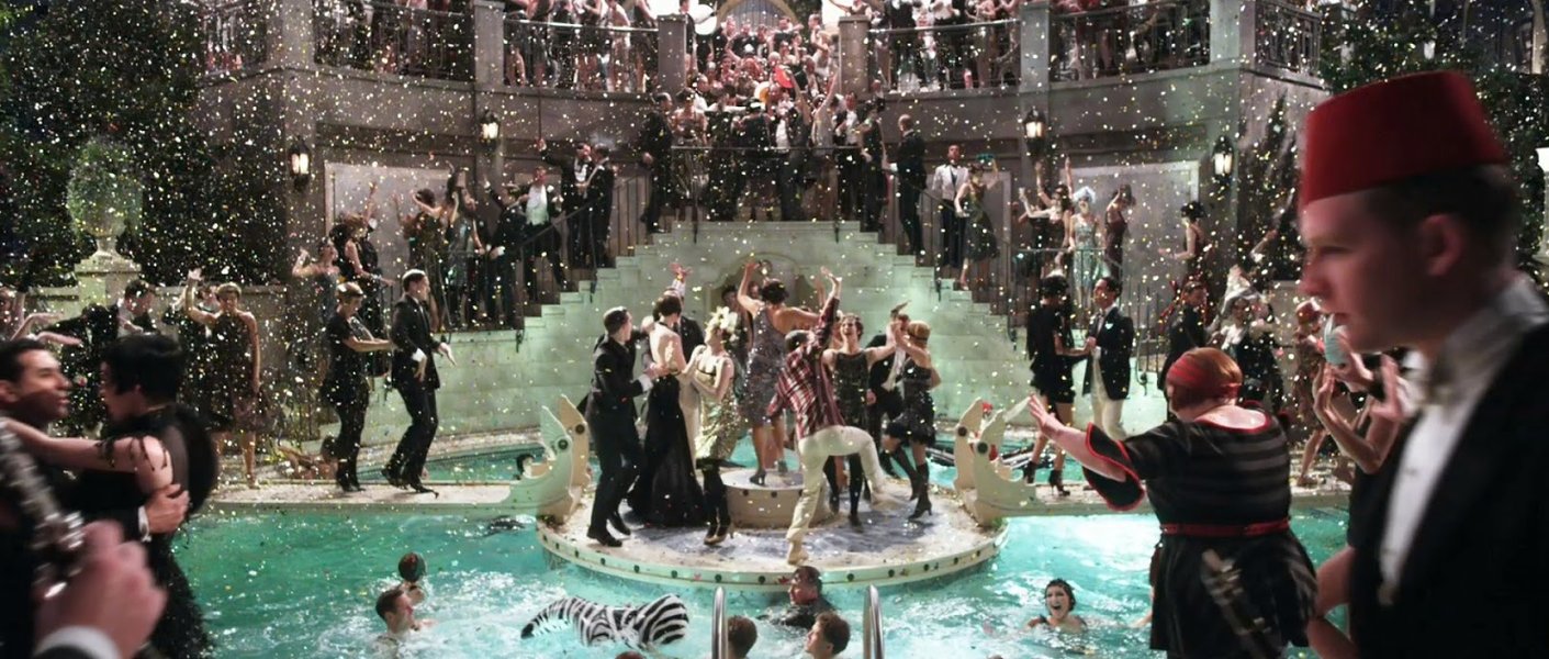 A lavish party scene at Gatsby's mansion