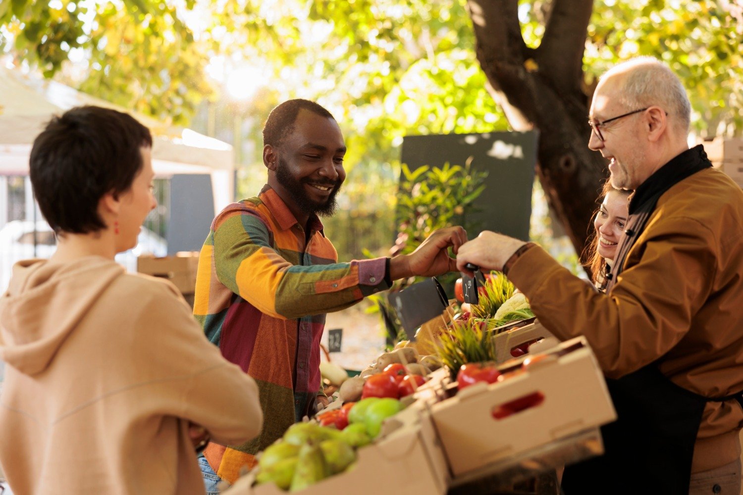 people greeting outside market