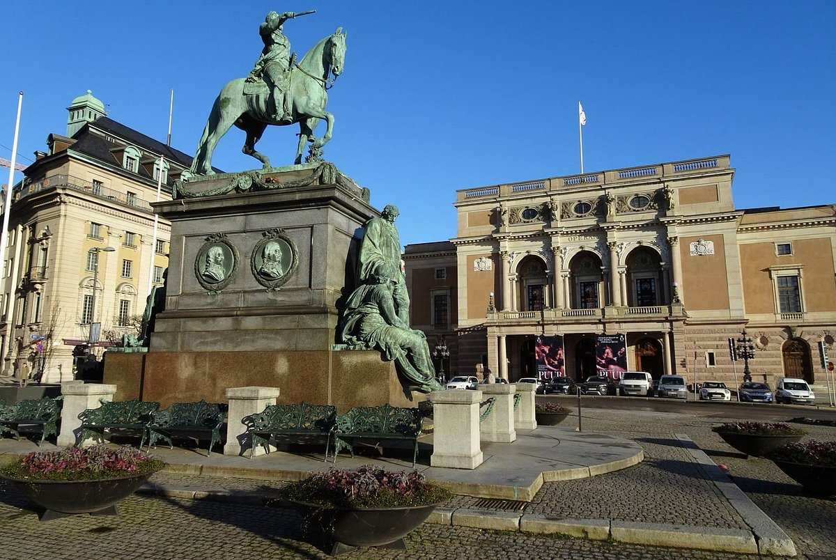 historical statue and opera house in Sweden