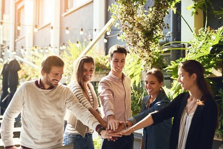 people greeting each other in urban environment