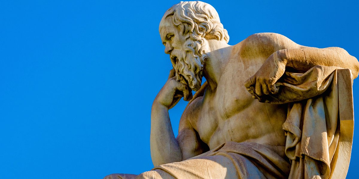 Statue of an ancient philosopher deep in thought