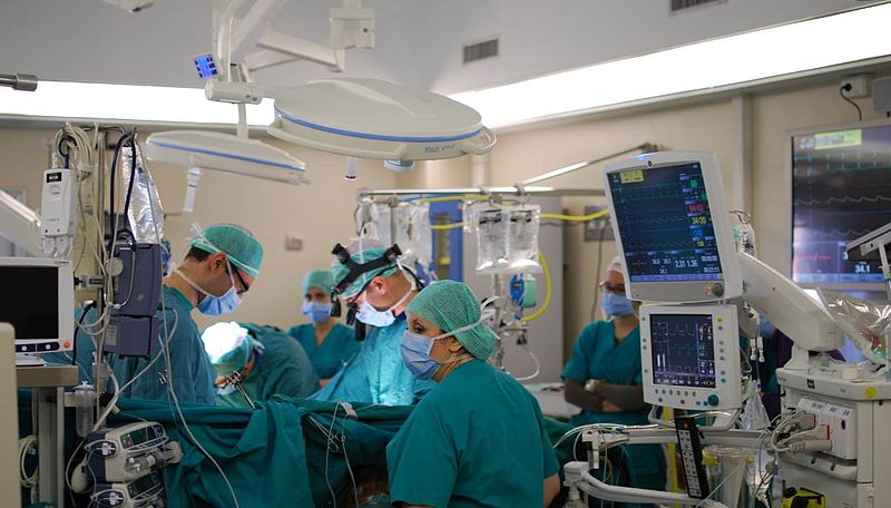 surgical team with equipments and monitoring