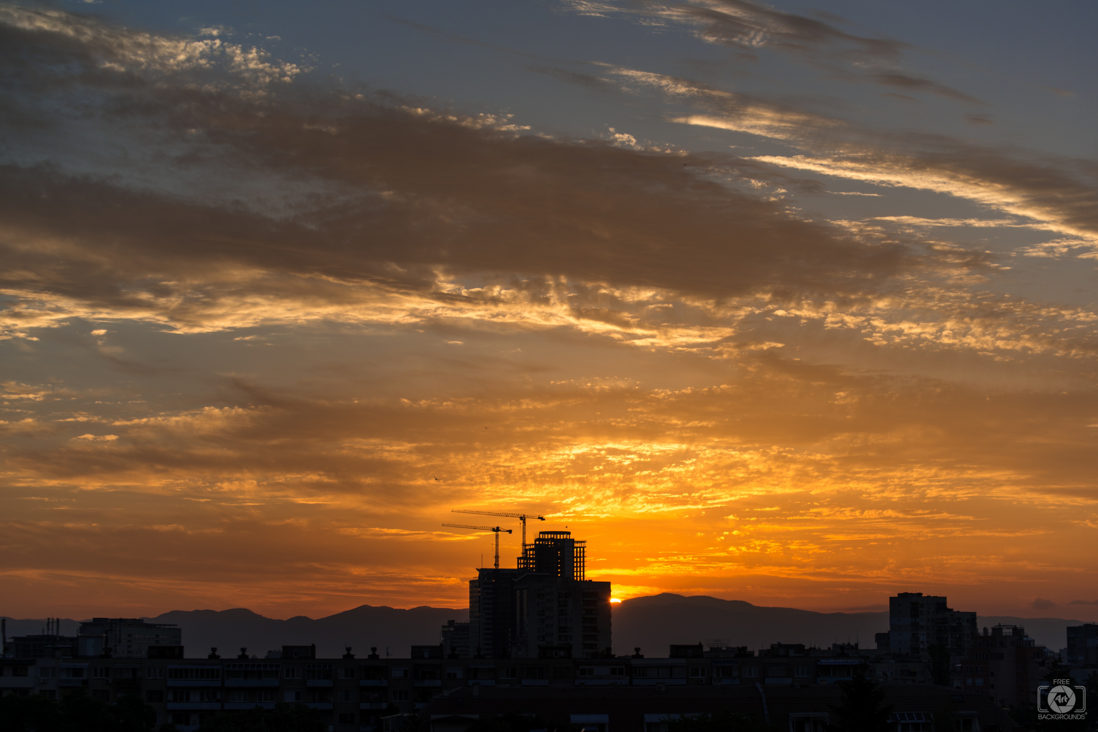 sunrise over cityscape