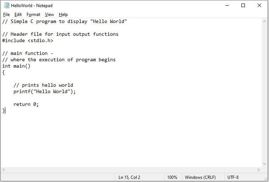 C code snippet showing the Hello World program with stdio.h and printf