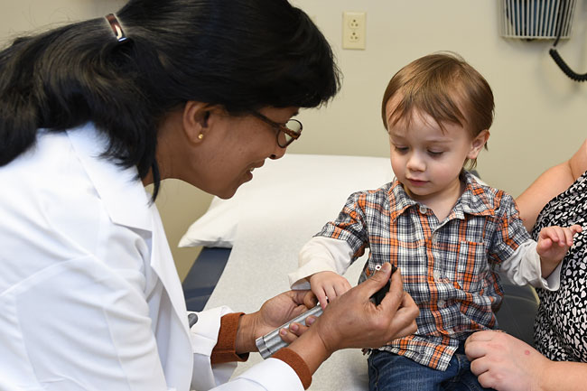 children in community center receiving care