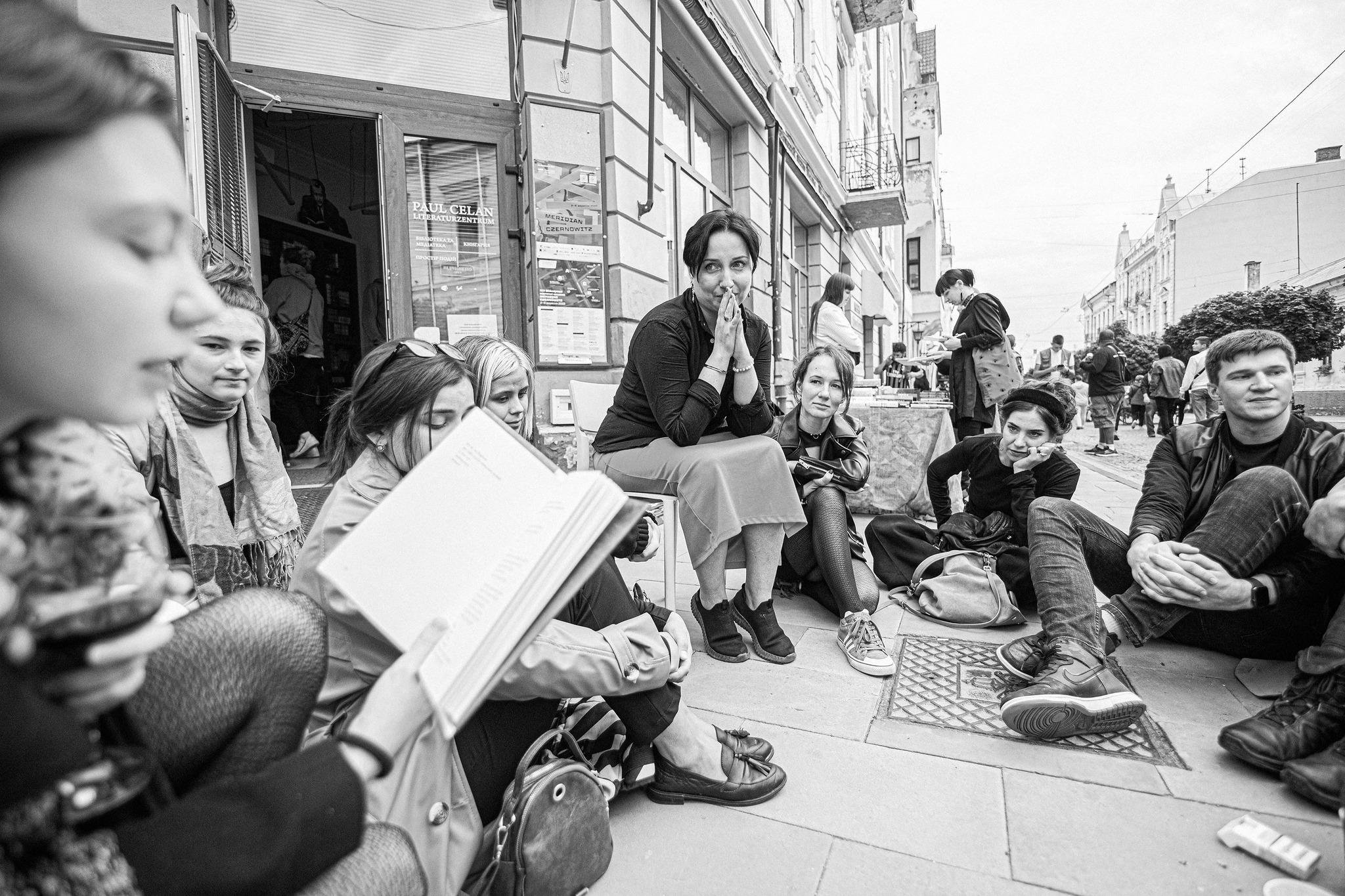 urban street photography with people having discussion