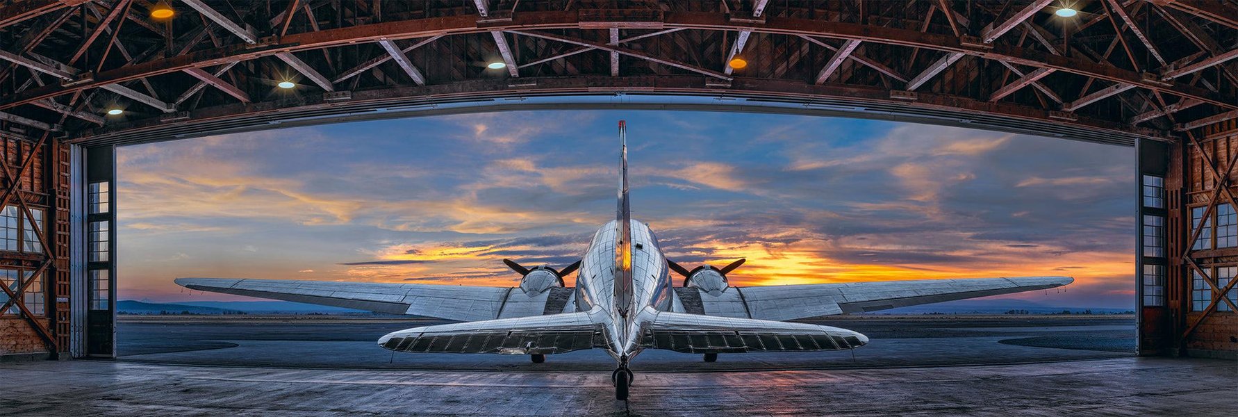 aircraft hangar sunset