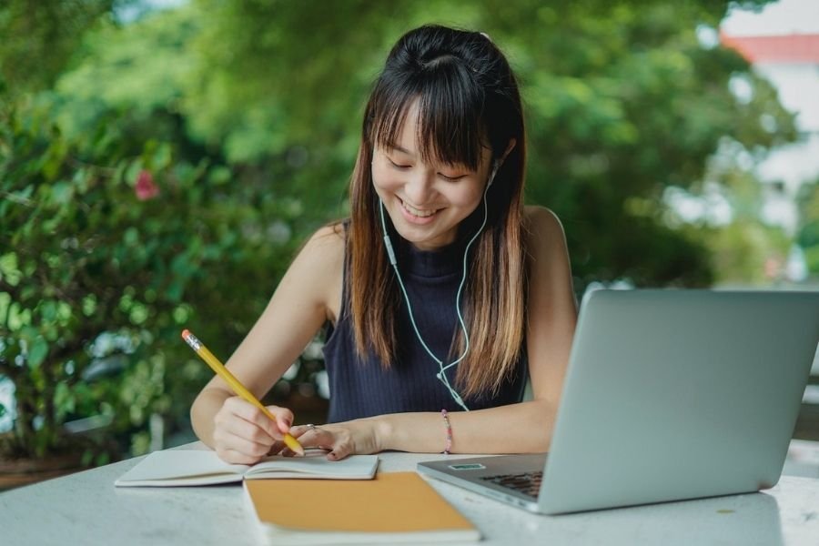Student focused on writing