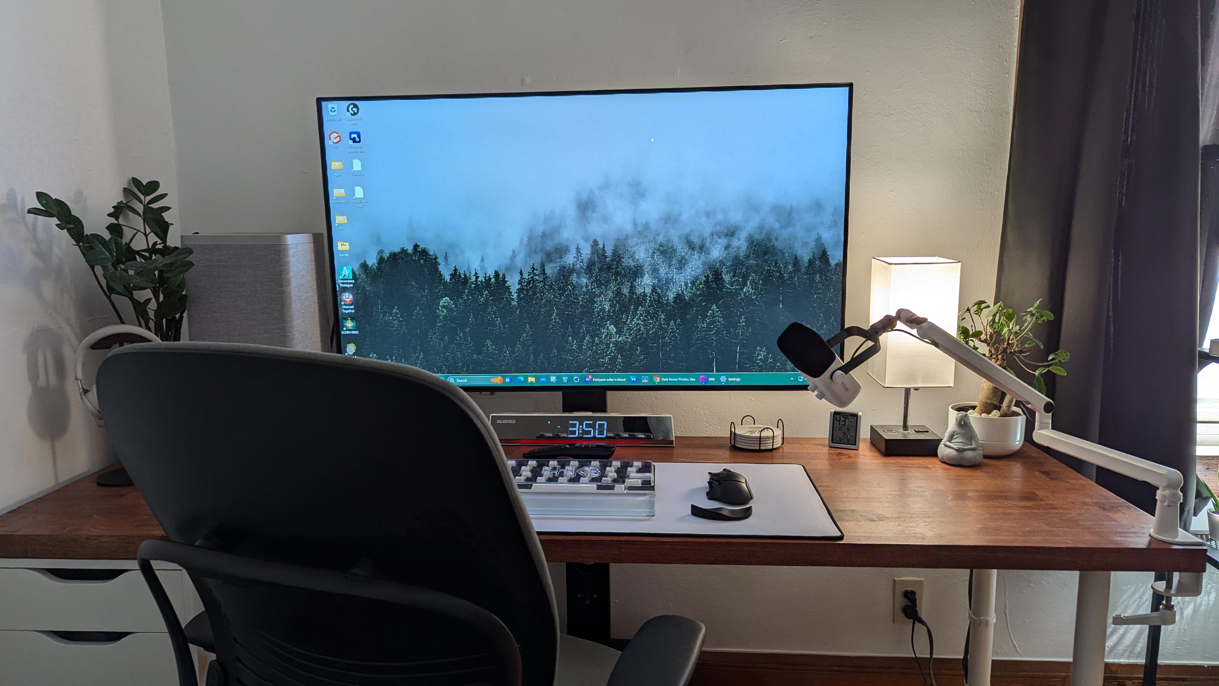 modern office desk with computer and papers